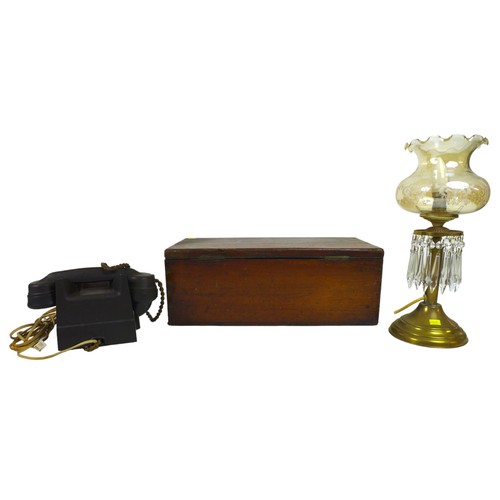 100 - A trio of collectables comprising a black Bakelite rotary telephone, 24 by 18.5 by 13cm high, oil st... 