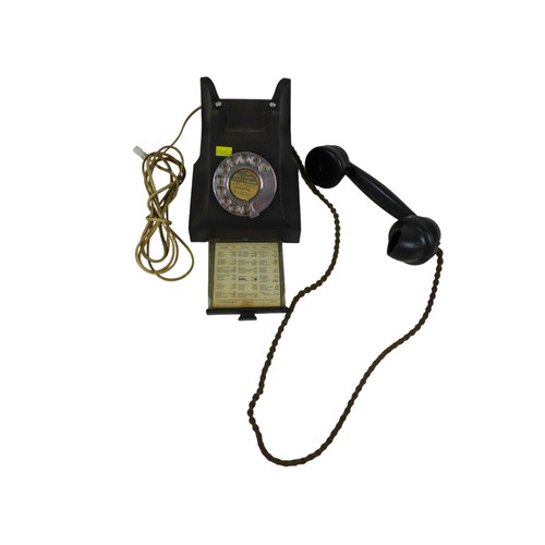 100 - A trio of collectables comprising a black Bakelite rotary telephone, 24 by 18.5 by 13cm high, oil st... 