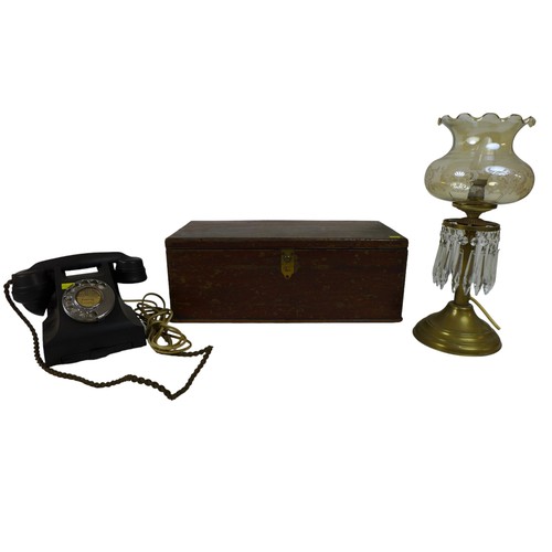 100 - A trio of collectables comprising a black Bakelite rotary telephone, 24 by 18.5 by 13cm high, oil st... 