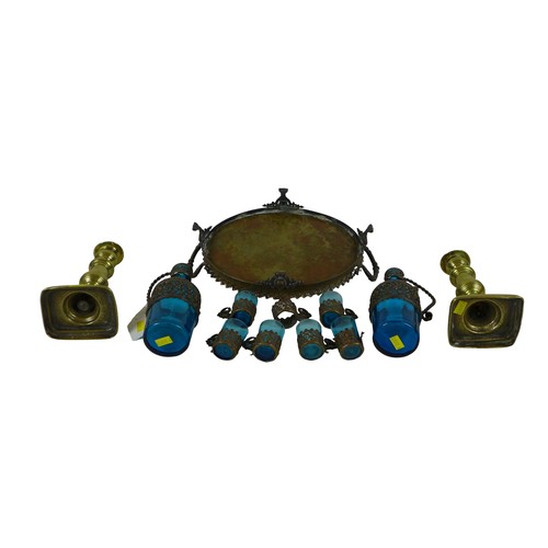 88 - A Continental blue glass and cast metal liqueur set, tray, two decanters, and six cups, 21cm high ov... 