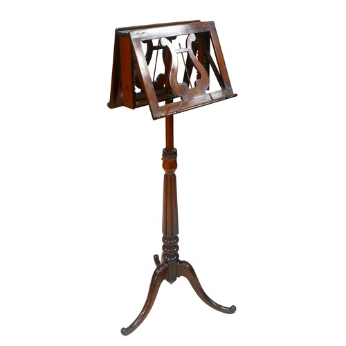 402 - A Victorian rosewood adjustable duet music stand, raised on a reeded column and tripod base, 56 by 4... 