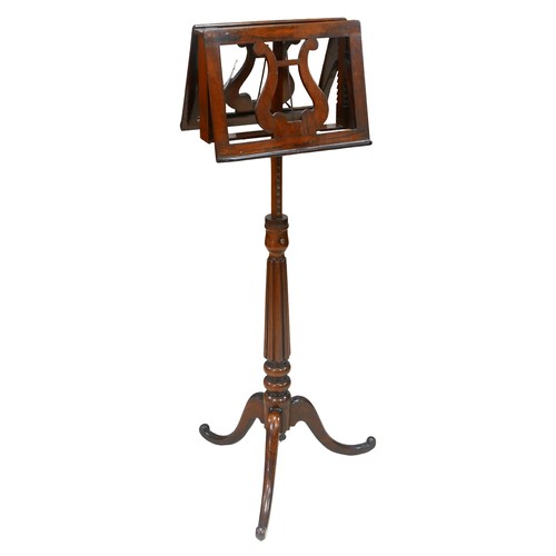 402 - A Victorian rosewood adjustable duet music stand, raised on a reeded column and tripod base, 56 by 4... 