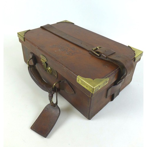 111 - A tan leather cartridge case by W. W. Greener, Gun Rifle and Ammunition Maker, Birmingham and London... 