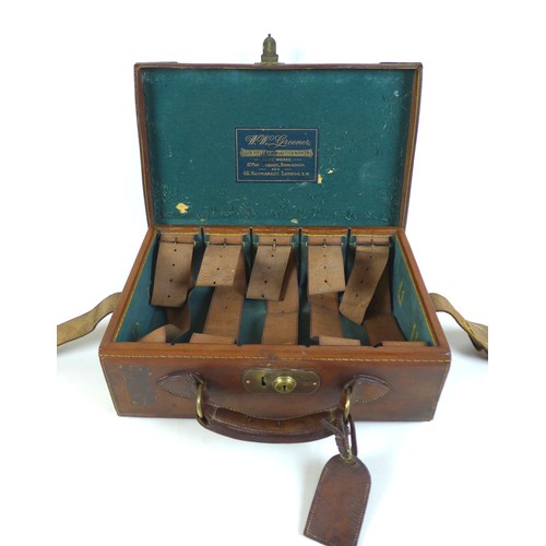 111 - A tan leather cartridge case by W. W. Greener, Gun Rifle and Ammunition Maker, Birmingham and London... 