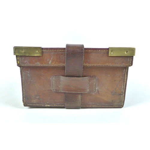 111 - A tan leather cartridge case by W. W. Greener, Gun Rifle and Ammunition Maker, Birmingham and London... 