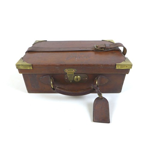 111 - A tan leather cartridge case by W. W. Greener, Gun Rifle and Ammunition Maker, Birmingham and London... 