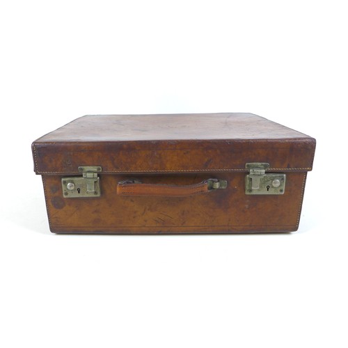 110 - An early 1900s tan leather picnic/motoring travel case by J. S. Vickery London, with a fitted interi... 