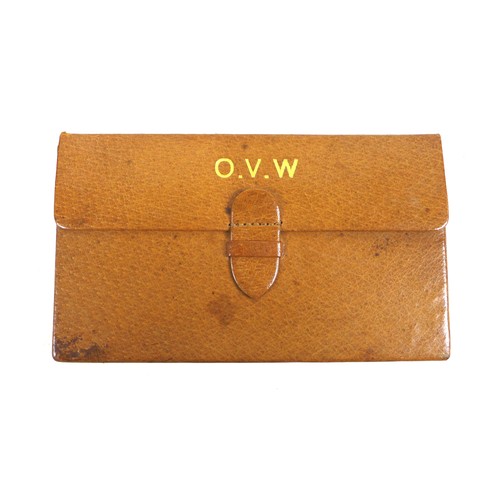 104 - A collection of vintage leather goods, comprising an Asprey of London leather gaming wallet; two cro... 