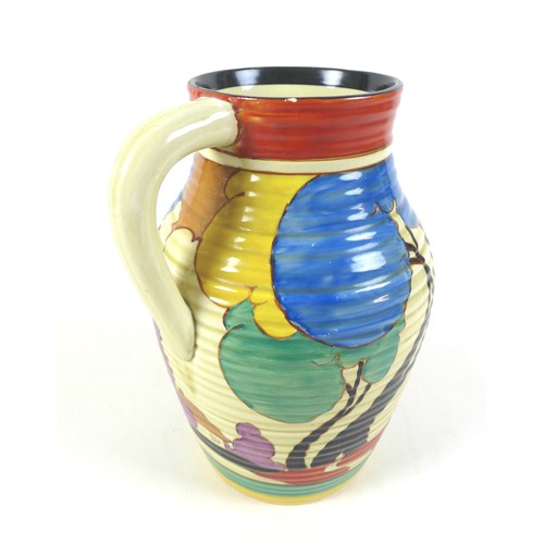 69 - A Clarice Cliff 'Blue Autumn' Isis jug, single handled, circa 1930, with Bizarre Fantasque marks, 29... 