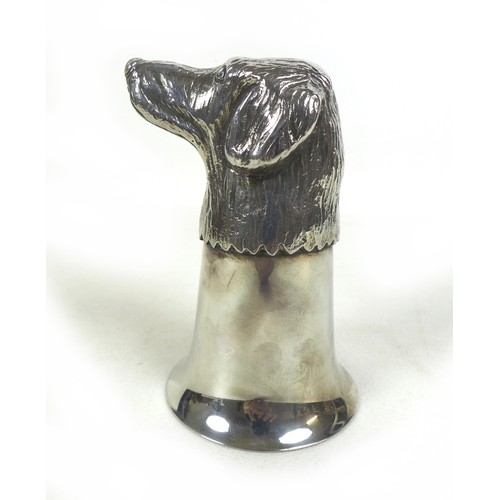 81 - Hunting interest: a silver plated stirrup cup, modelled as a hound's head, unmarked, 11.8cm high.