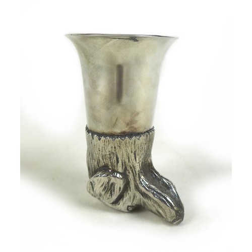 81 - Hunting interest: a silver plated stirrup cup, modelled as a hound's head, unmarked, 11.8cm high.