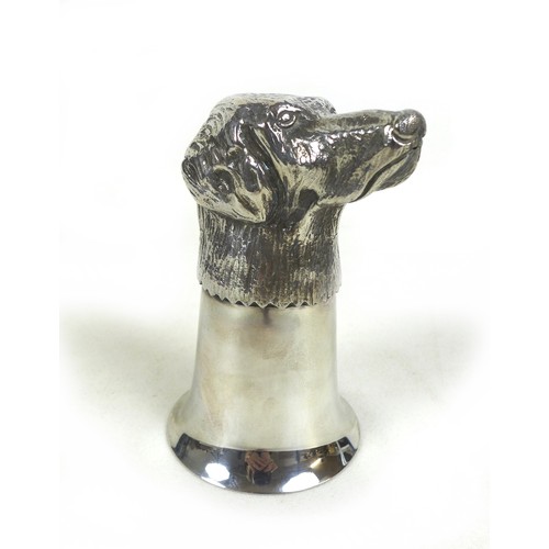 81 - Hunting interest: a silver plated stirrup cup, modelled as a hound's head, unmarked, 11.8cm high.