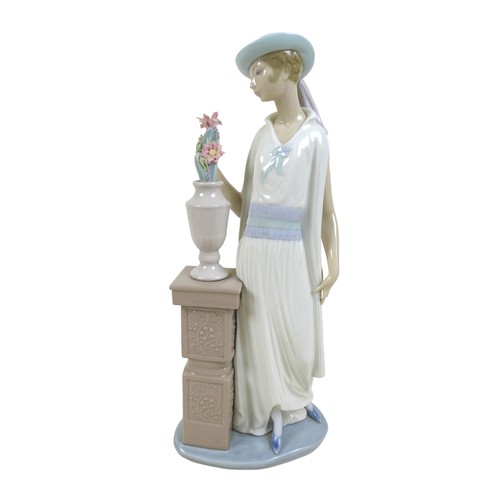 63 - Three 1920s style Lladro lady figurines, comprising 'Lady Grand Casino', #5175, 34.5cm high; 'Couple... 