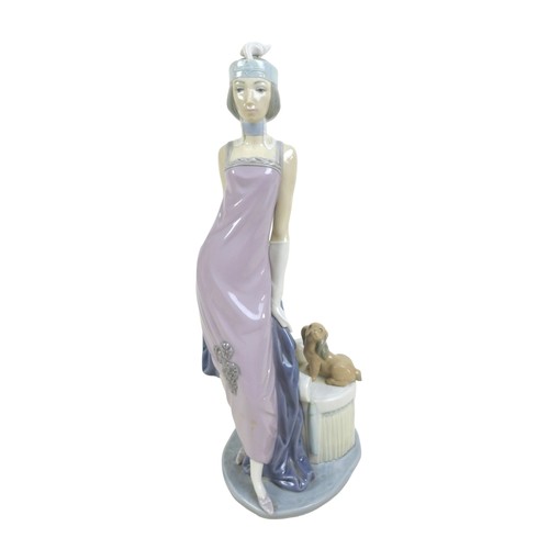 63 - Three 1920s style Lladro lady figurines, comprising 'Lady Grand Casino', #5175, 34.5cm high; 'Couple... 