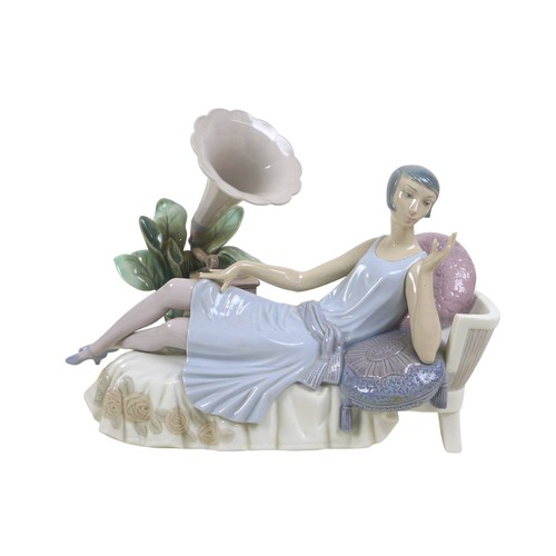 63 - Three 1920s style Lladro lady figurines, comprising 'Lady Grand Casino', #5175, 34.5cm high; 'Couple... 