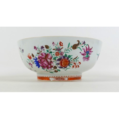 65 - An 18th century Chinese porcelain bowl, enamelled floral decoration, a/f hairline to base and small ... 