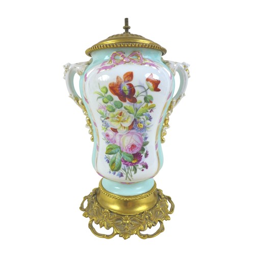 51 - A 20th century ceramic and gilt metal lamp, hand painted with flowers, with moulded twin handles, ra... 