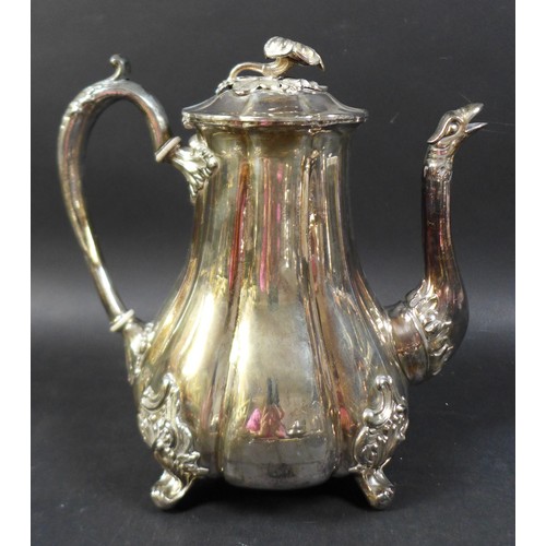 84 - A group of silver plated wears, including a pair of candelabras, tea and coffee pots, a group of blu... 