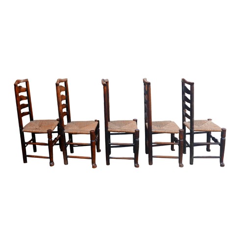 390 - A set of five 18th century oak country ladderback chairs, with rush seats. (5)