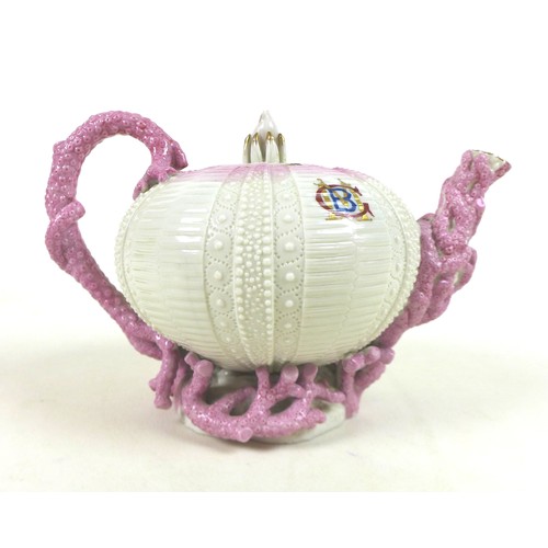 59 - A Belleek Echinus teapot with pink coral detail, decorated with gilt highlights and hand painted 'CM... 