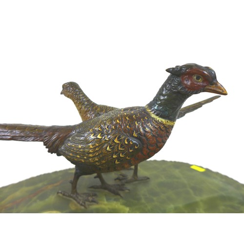 112 - An early 20th century onyx desk stand, decorated with a brace of cold painted bronze pheasants, the ... 