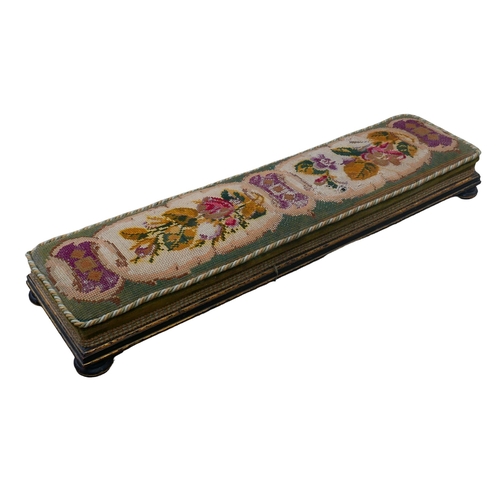 394 - A Victorian ebonised footstool / kneeler by George Spademan of Stamford, with embroidered cushion, r... 