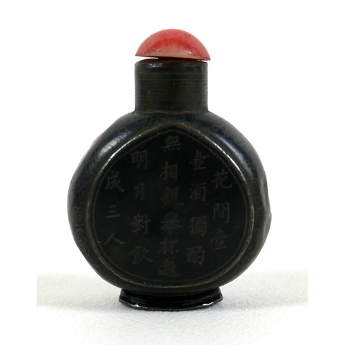 17 - A 19th century Chinese snuff bottle, metal and black enamel, ovoid form with two inscribed panels fr... 