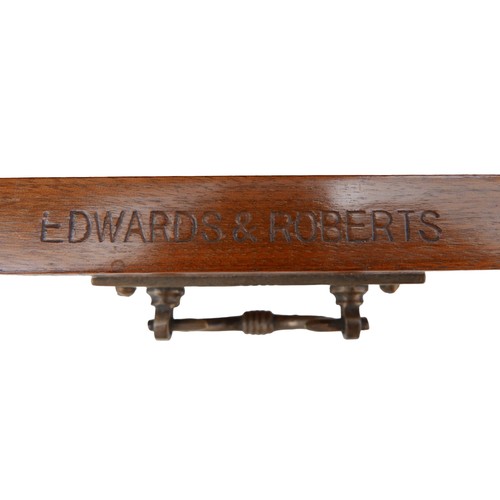 397 - A late Victorian mahogany Canterbury by Edwards & Roberts, with turned supports, single drawer to it... 