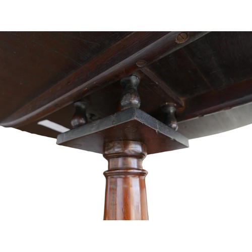 388 - A George III style mahogany round tilt top table, with birds nest support, raised upon a tripod base... 