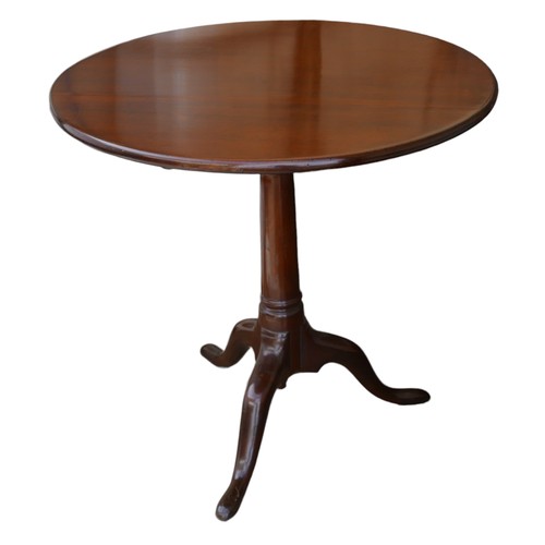 388 - A George III style mahogany round tilt top table, with birds nest support, raised upon a tripod base... 