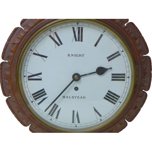 124 - An oak cased wall clock with single fusee movement by Knight of Halstead, with enamel dial with Roma... 