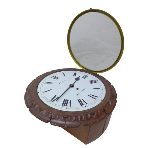 124 - An oak cased wall clock with single fusee movement by Knight of Halstead, with enamel dial with Roma... 