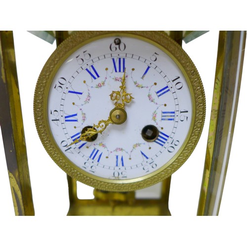 117 - A 19th century marble and glass panelled, mantel clock, with brass frame, Roman numeral dial, twin t... 