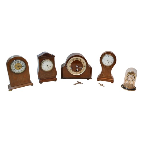 118 - Four wooden cased mantel clocks, including a balloon clock with brass inlays, 24.5cm high, together ... 