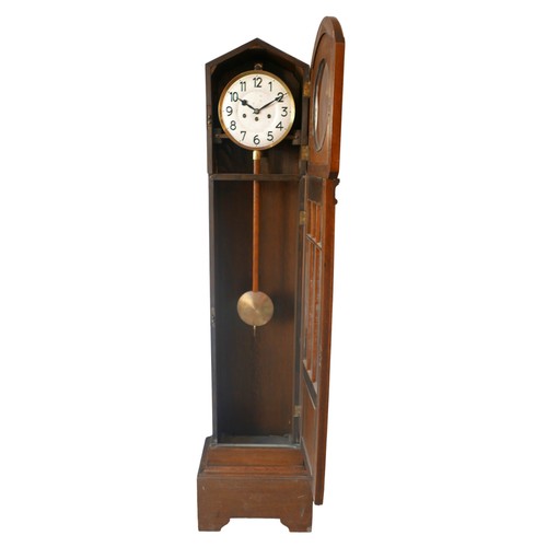 A mid 20th century Junghans oak longcase clock silvered dial with