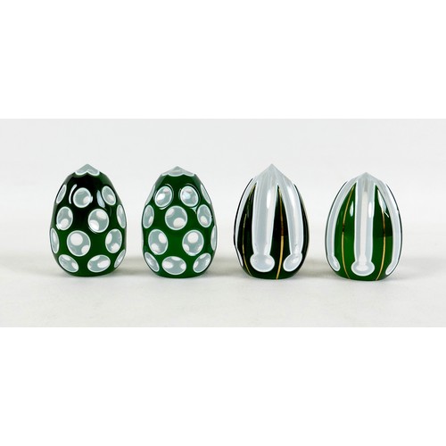 39 - A group of four Saint Louis flashed glass paperweights, comprising a pair of green, white and clear ... 