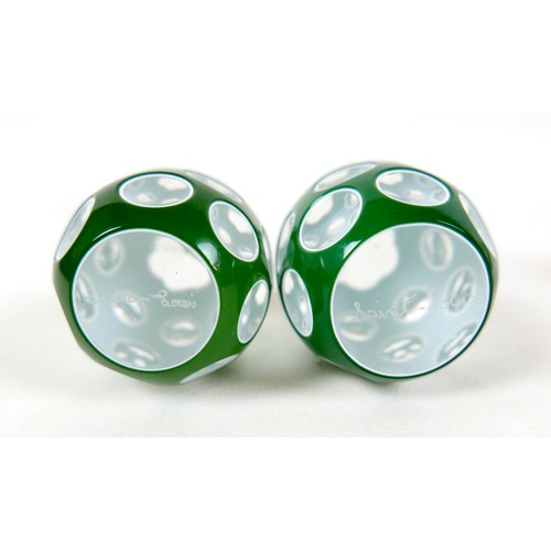 39 - A group of four Saint Louis flashed glass paperweights, comprising a pair of green, white and clear ... 