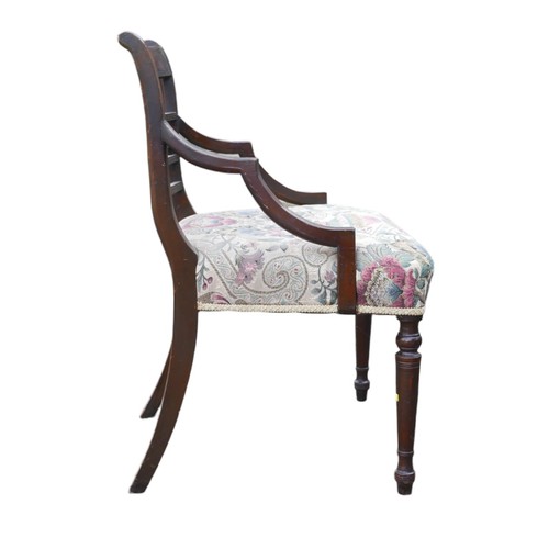 391A - A set of eight Regency bar back dining chairs including two carvers, with upholstered seats, raised ... 