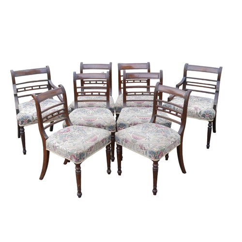 391A - A set of eight Regency bar back dining chairs including two carvers, with upholstered seats, raised ... 