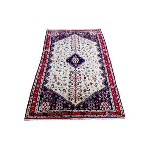 401 - A Shiraz rug, 215 by 127cm.