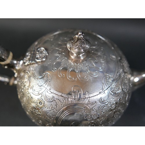 3 - A Victorian Scottish silver three piece tea service, with engraved floral decoration, presentation a... 