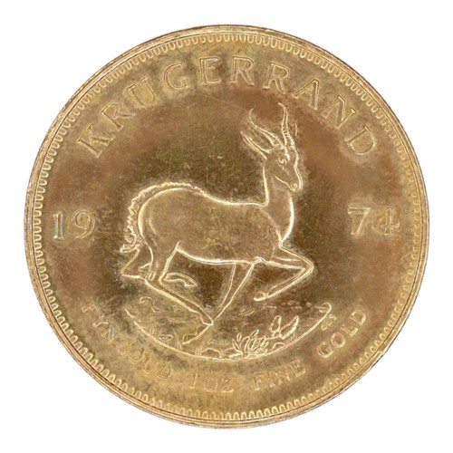 A 22ct gold South African Krugerrand, 1974, 'Fyngoud 1oz Fine Gold', 32.4mm, 34.0g.