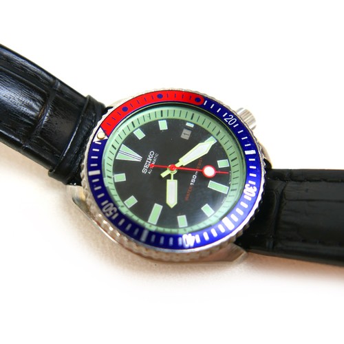 175 - A Seiko Automatic Pepsi dial gentleman's wristwatch, 42mm case, on black leather strap.