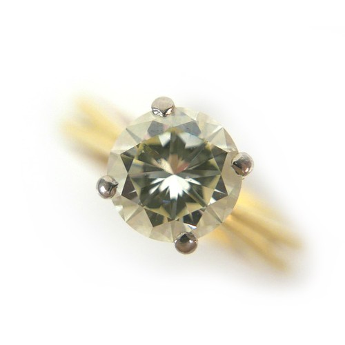 357 - An 18ct gold 1.55ct diamond solitaire ring, the round faceted cut stone, 7.6 by 4.5mm, in four claw ... 