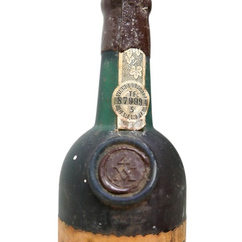 12 - Vintage Port: a bottle of 1977 Taylor's tawny port, wax capsule, U: base of shoulder.