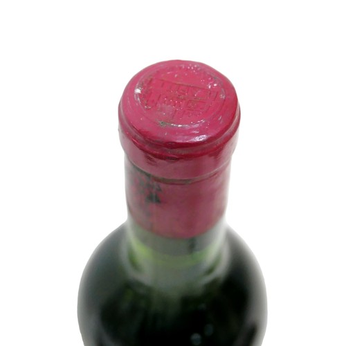 24 - Vintage wine: a bottle of 1967 Chateau Lafite-Rothschild, Pauillac, U: near top of shoulder.
