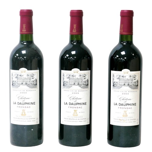 16 - Vintage wine: three bottles of 2003 Chateau de la Dauphine Fronsac, U: all above shoulder, in opened... 