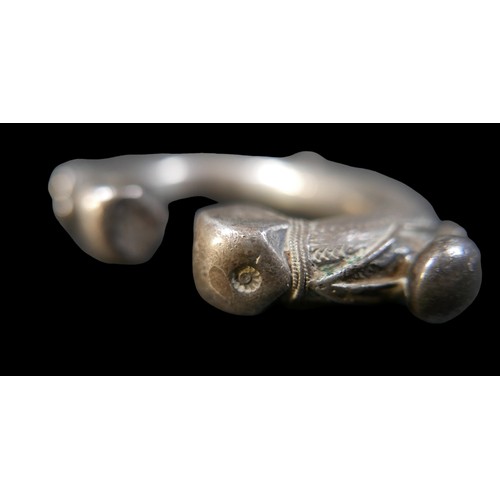 224 - Two Persian metal 'anklets', with stamped and applied decoration, larger anklet measured 9.5cm acros... 