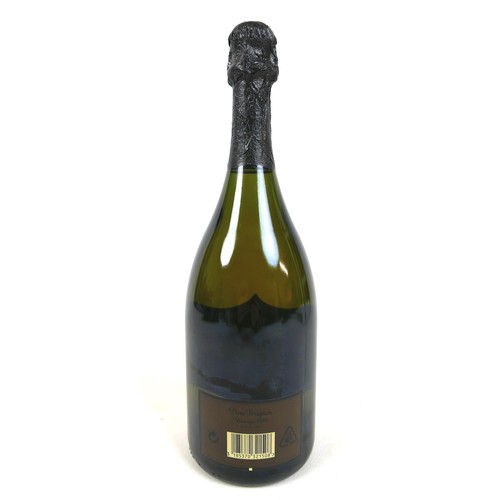 20 - Vintage Champagne: a bottle of Moet & Chandon Champagne, Cuvee Dom Perignon, Vintage 1999, together ... 