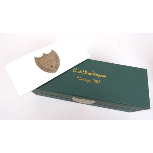 20 - Vintage Champagne: a bottle of Moet & Chandon Champagne, Cuvee Dom Perignon, Vintage 1999, together ... 